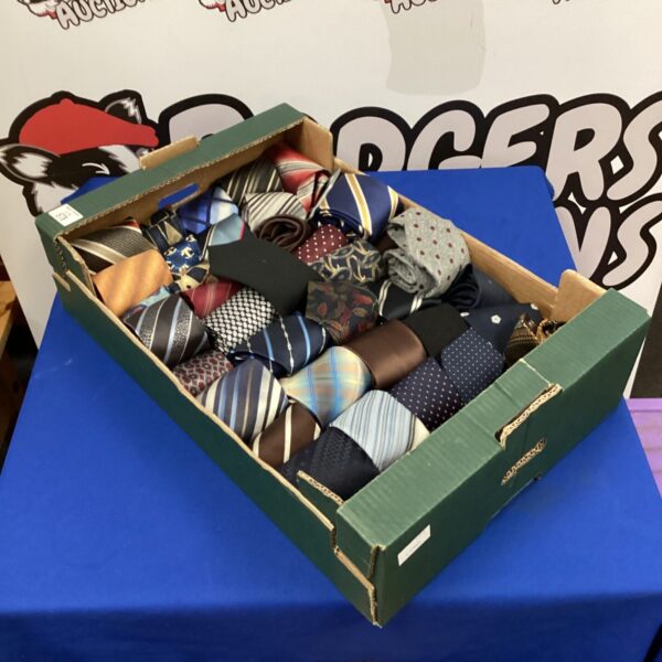 Assorted silk ties in a box, a men's fashion accessory lot.