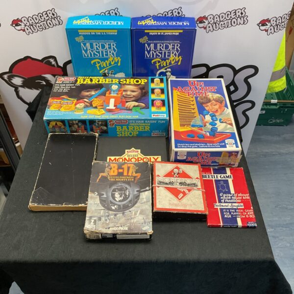 Mixed lot of vintage board games including Palitoy and Monopoly.