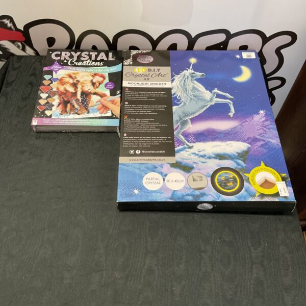 Two Crystal Art kits in original packaging, ready for crafting.