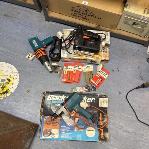Black & Decker power tool lot including drill and sander.