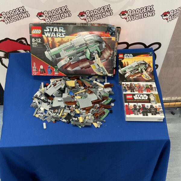 Vintage Lego Star Wars Slave I set 6209 with manual and encyclopaedia.