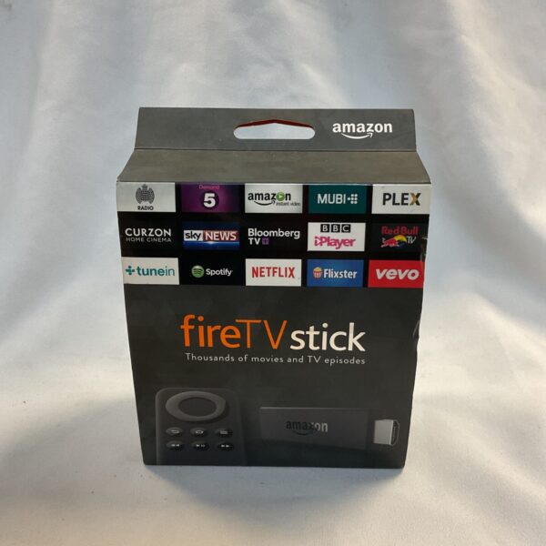 Amazon Fire Stick with remote control for streaming media.