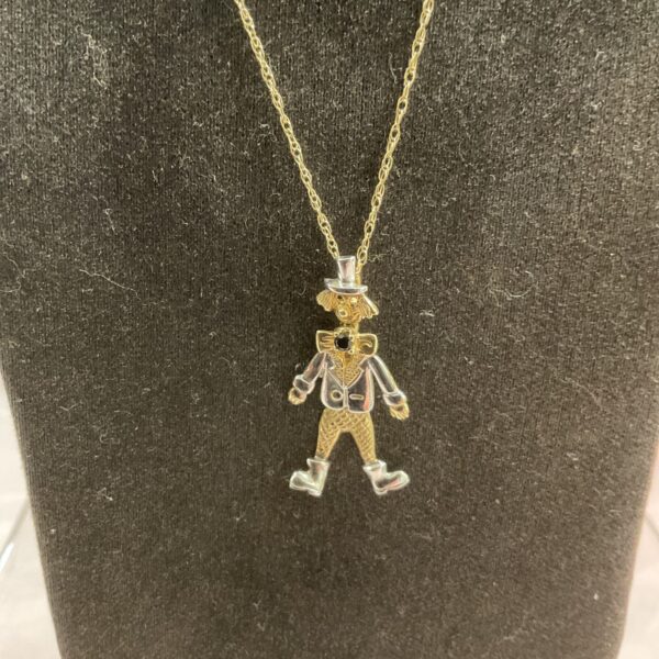 Vintage 9ct gold articulated clown pendant on necklace