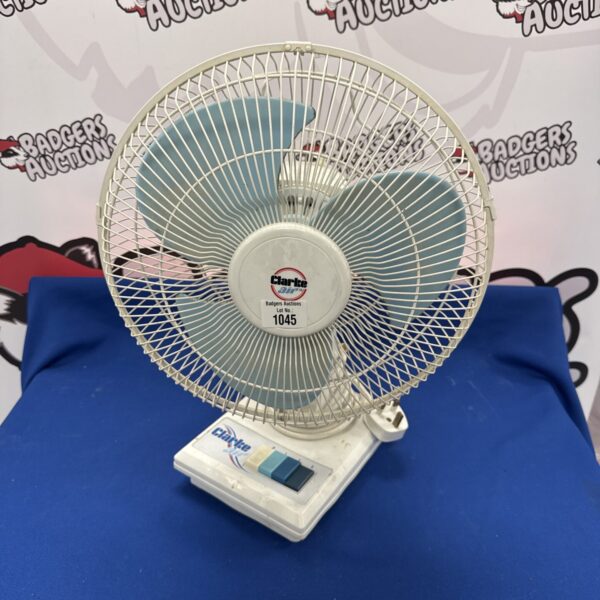 Vintage Clarke oscillating desk fan in grey plastic.
