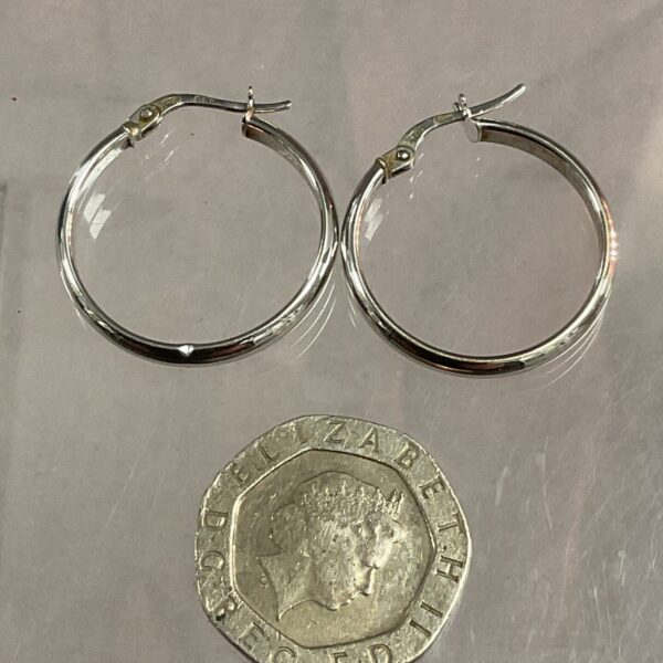 Pair of 9ct white gold hoop earrings, elegant and classic.