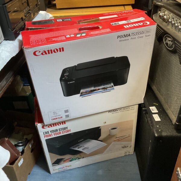 Boxed Canon TS3550i and MG3650s wireless inkjet printers for home use.