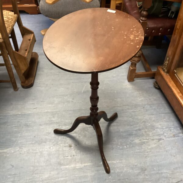 Vintage mahogany wine table with tripod legs.