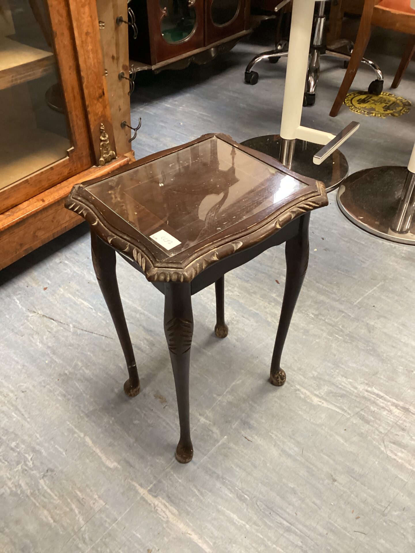 577 Small glass topped mahogany side table