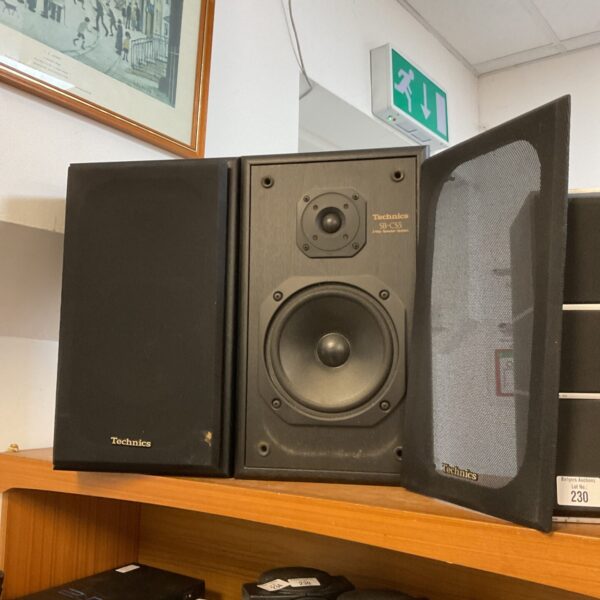 Pair of vintage Technics SB-CS5 bookshelf speakers in woodgrain finish.