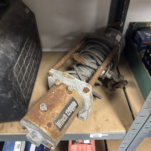 Vintage heavy duty winch with steel drum and mechanism.