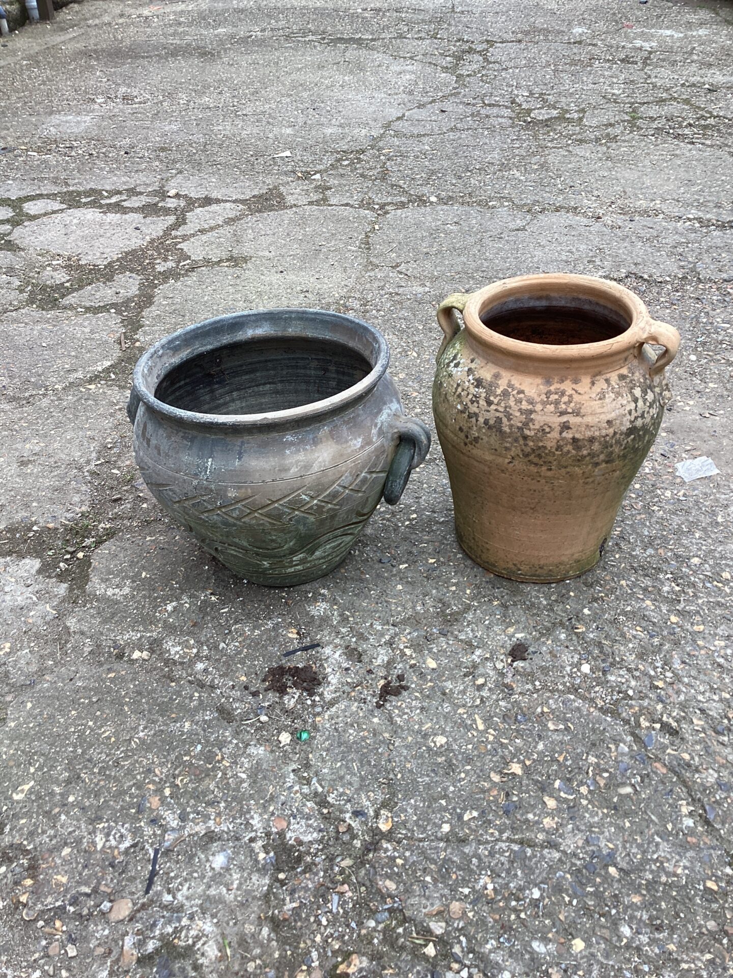 1215 Two terracotta garden urns