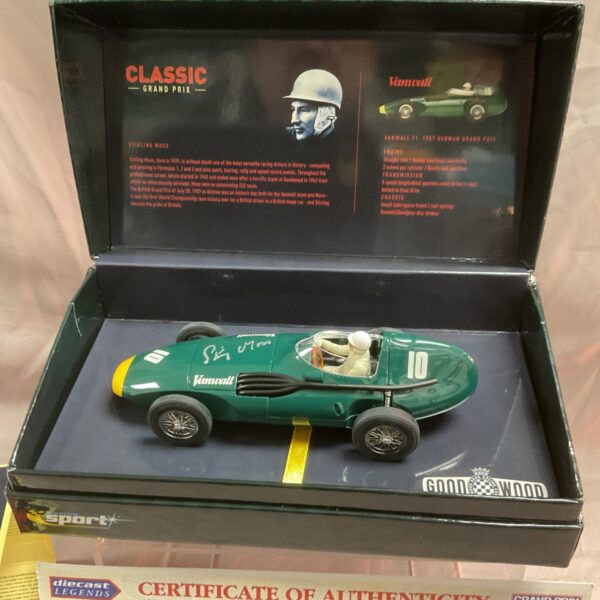Signed Stirling Moss Vanwall F1 Scalextric car in display case.