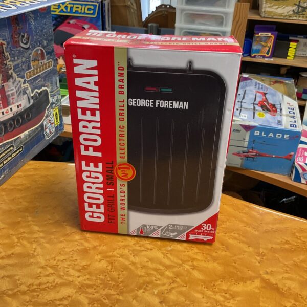 New George Foreman Fit Grill in original packaging.