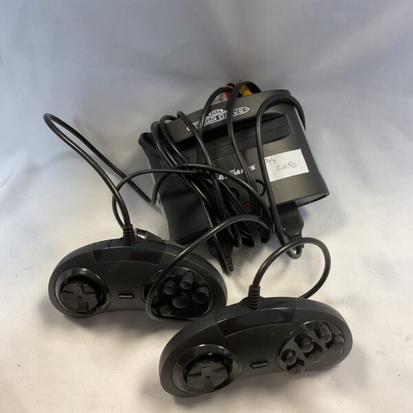 Atgames Sega Megadrive console with controllers, retro gaming system.