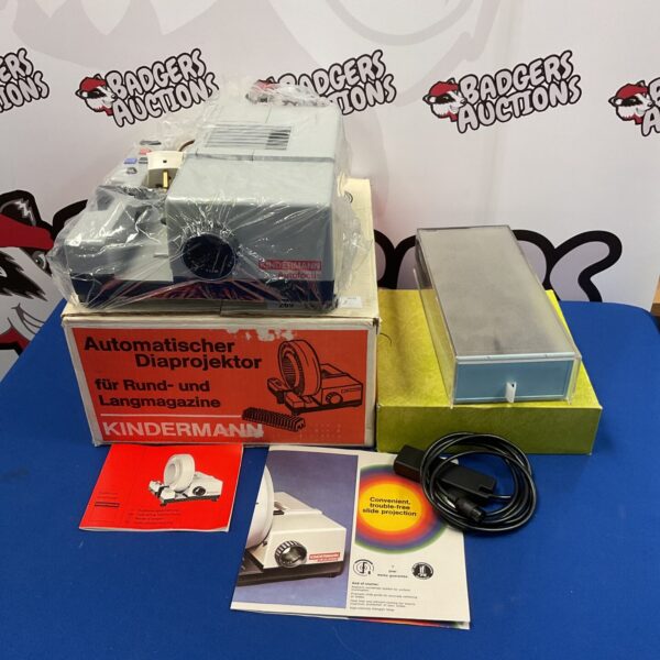 Vintage Kindermann 35mm slide projector with magazines.