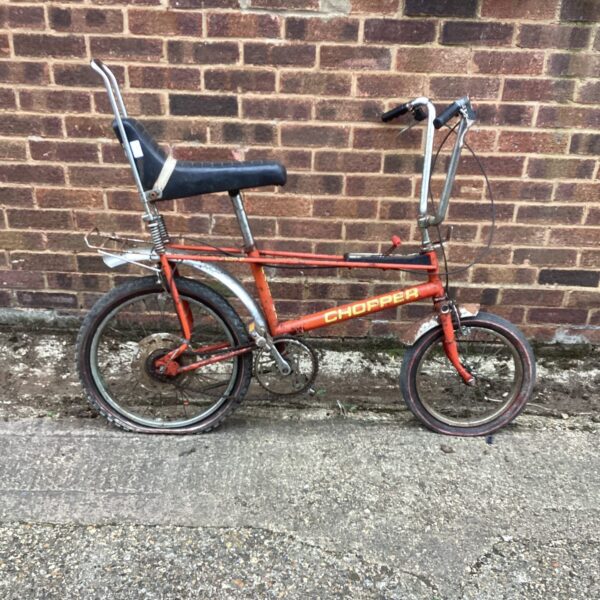 Side view of a vintage Raleigh Chopper Mk2 bicycle.
