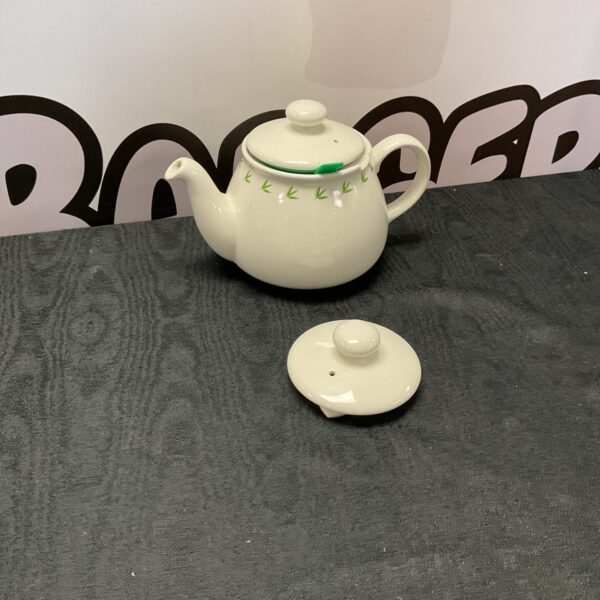 Vintage Pg Tips teapot with extra lid, collectible ceramic tea service.