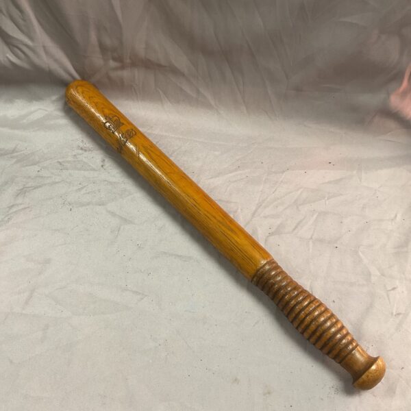 Antique Victorian truncheon with ribbed handle, a collectible police baton.