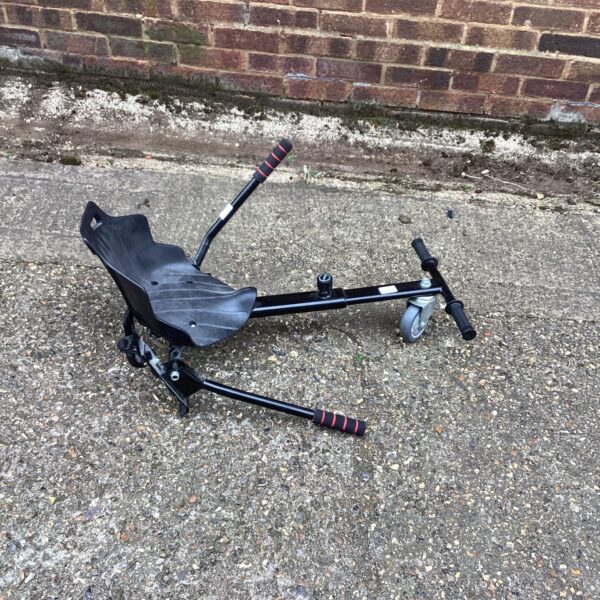 Black hoverboard kart attachment for self-balancing scooters.