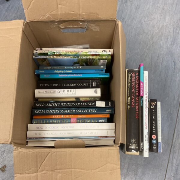 Mixed lot of cooking and art books including Delia Smith titles.
