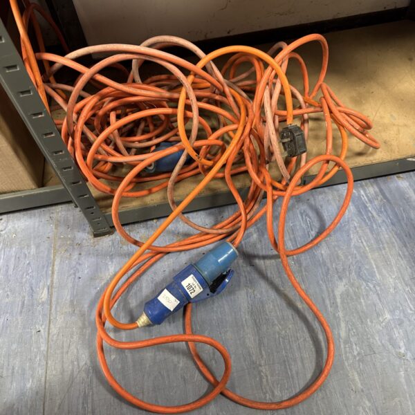 Orange caravan power cable with blue 16 amp plug.