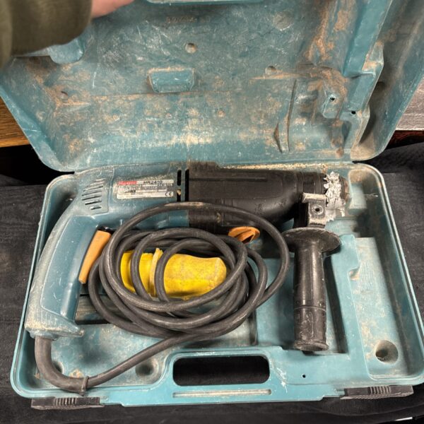 Front view of a vintage Makita HR2410 110v hammer drill.