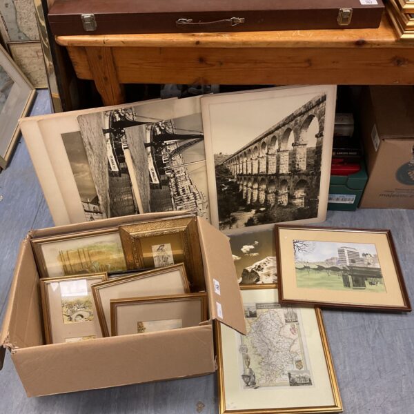Vintage photograph collection with framed prints and Indian bone painting.