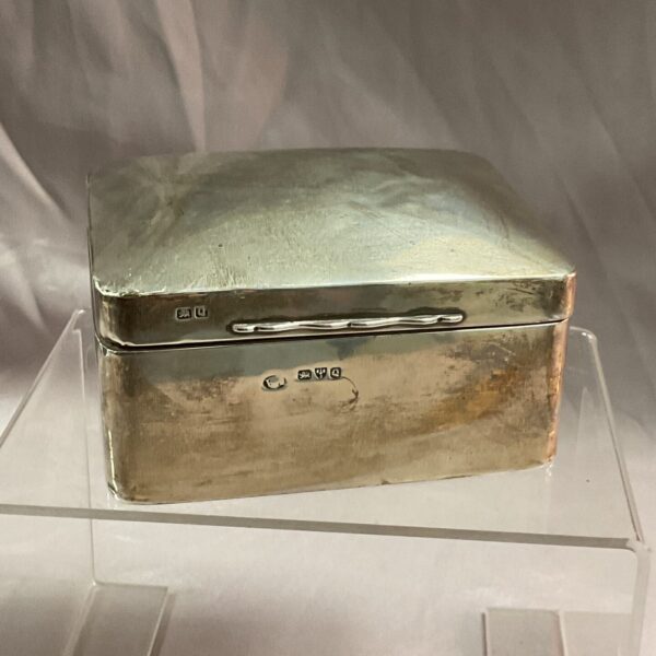 Antique silver cigarette box with Chester hallmarks.