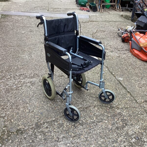 Silver Days folding wheelchair with black seat, side view.