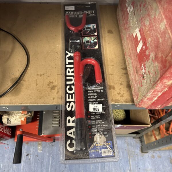 New car steering wheel lock model 108 in original packaging.
