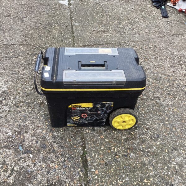 Vintage Stanley Pro tool box with wheels for tool storage.