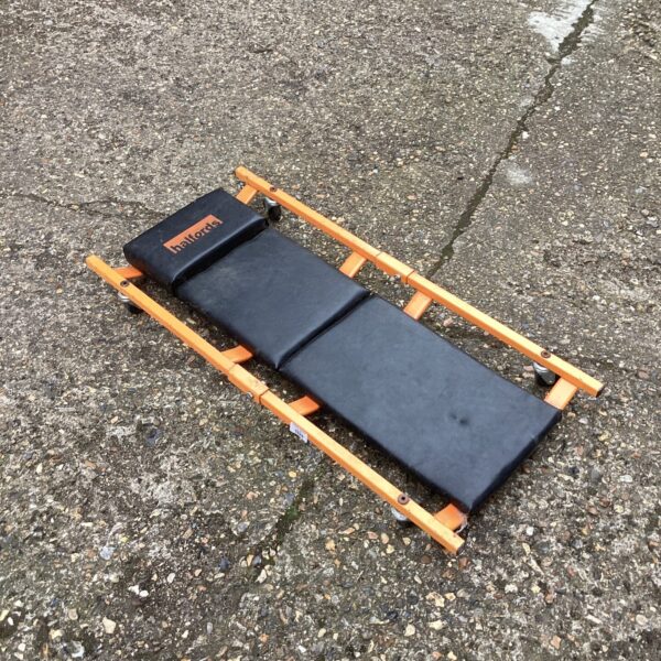 Halfords mechanics crawler board for automotive work.