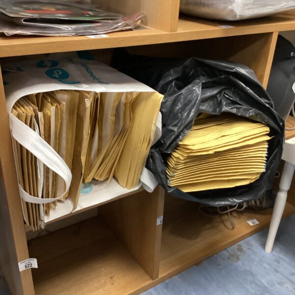 Stack of jiffy envelopes for secure mailing and shipping.