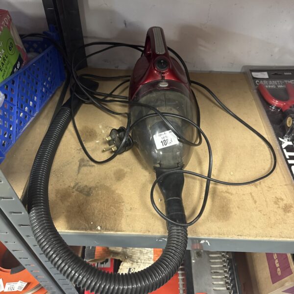 240v handheld vacuum cleaner with flexible hose for portable cleaning.