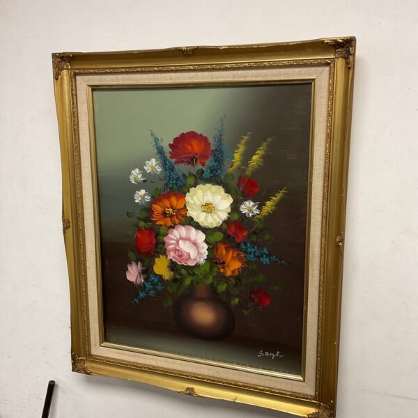 Vintage still life oil painting of flowers by S zough.