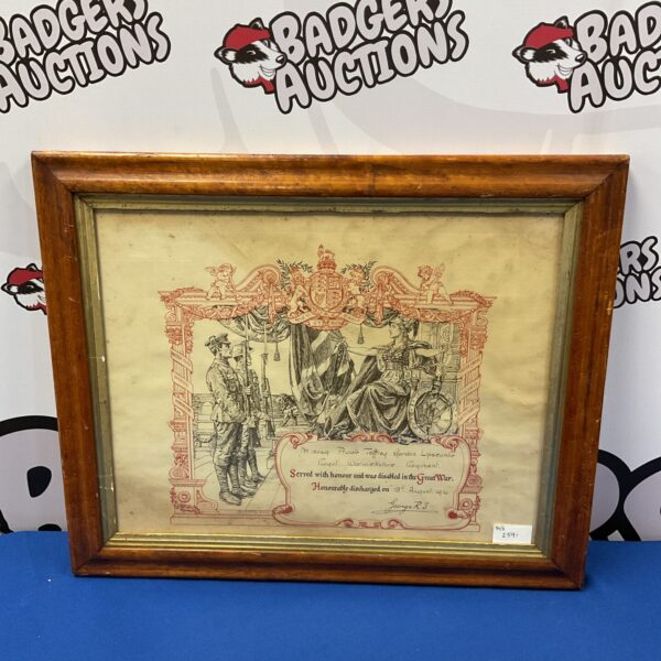 Framed World War One discharge certificate, a historical military document.