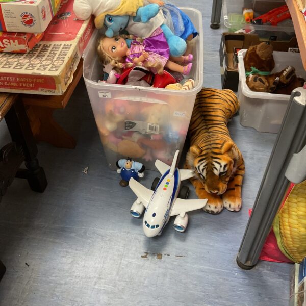Mixed toy lot with Smurfs, Paw Patrol, and Disney toys.