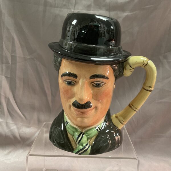 Royal Doulton Charlie Chaplin character jug, detailed front view.