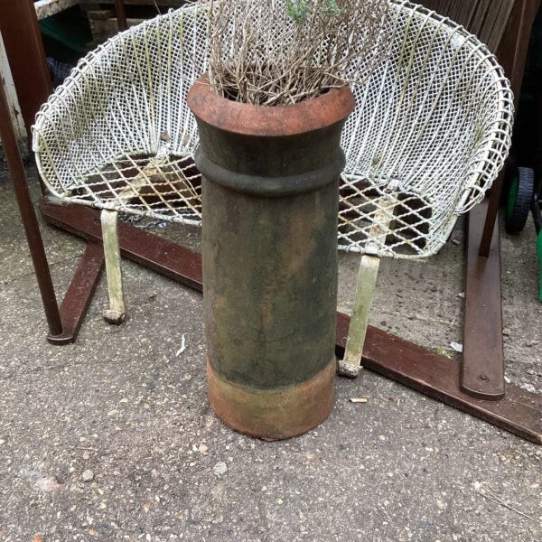 Vintage terracotta chimney pot for garden decoration and salvage.