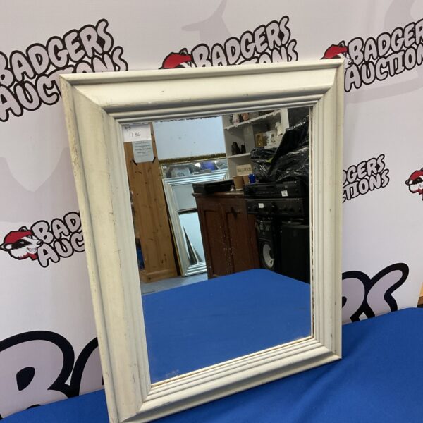 White framed shabby chic mirror for wall decoration.