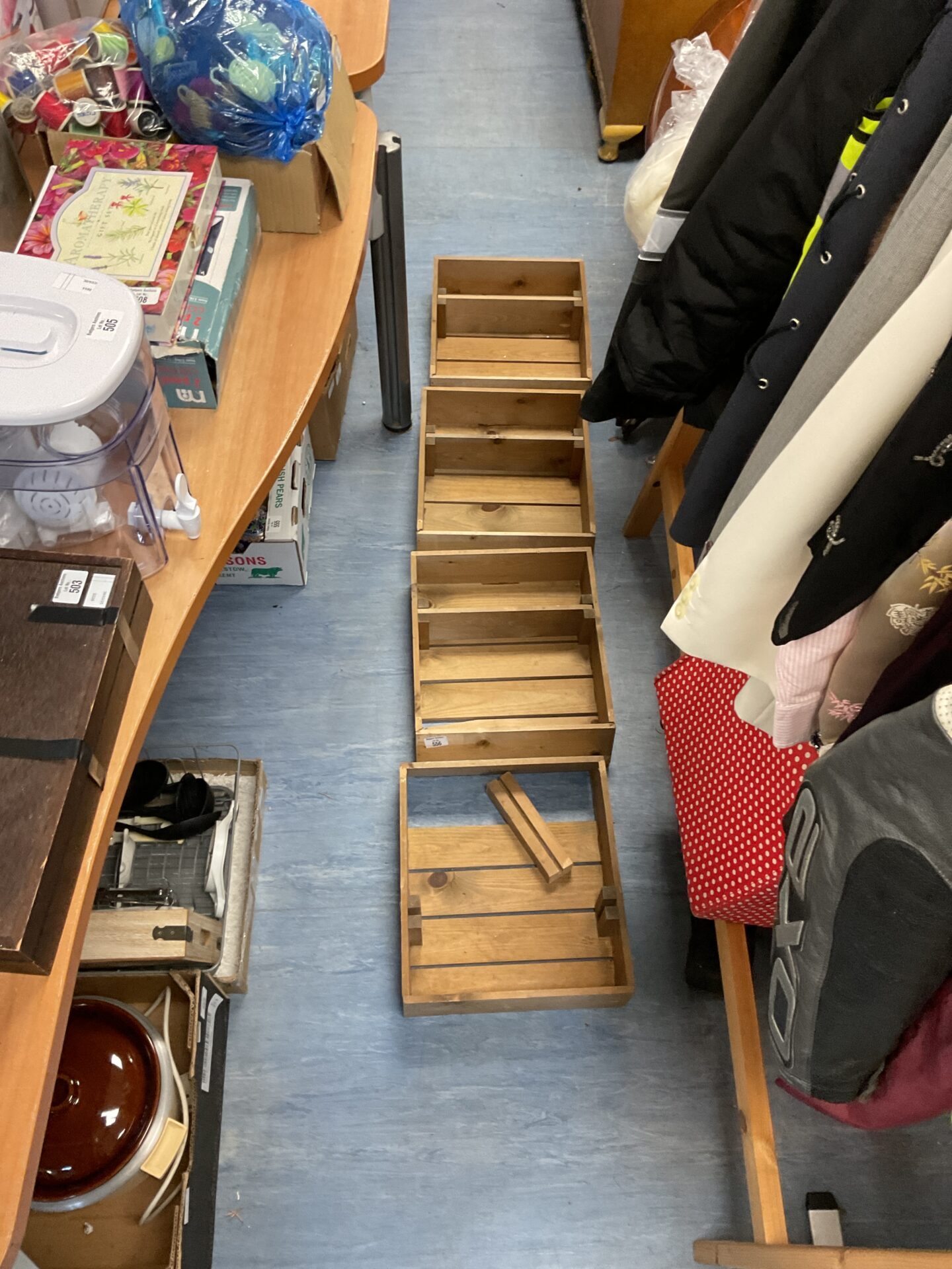 556 Four wooden storage crates