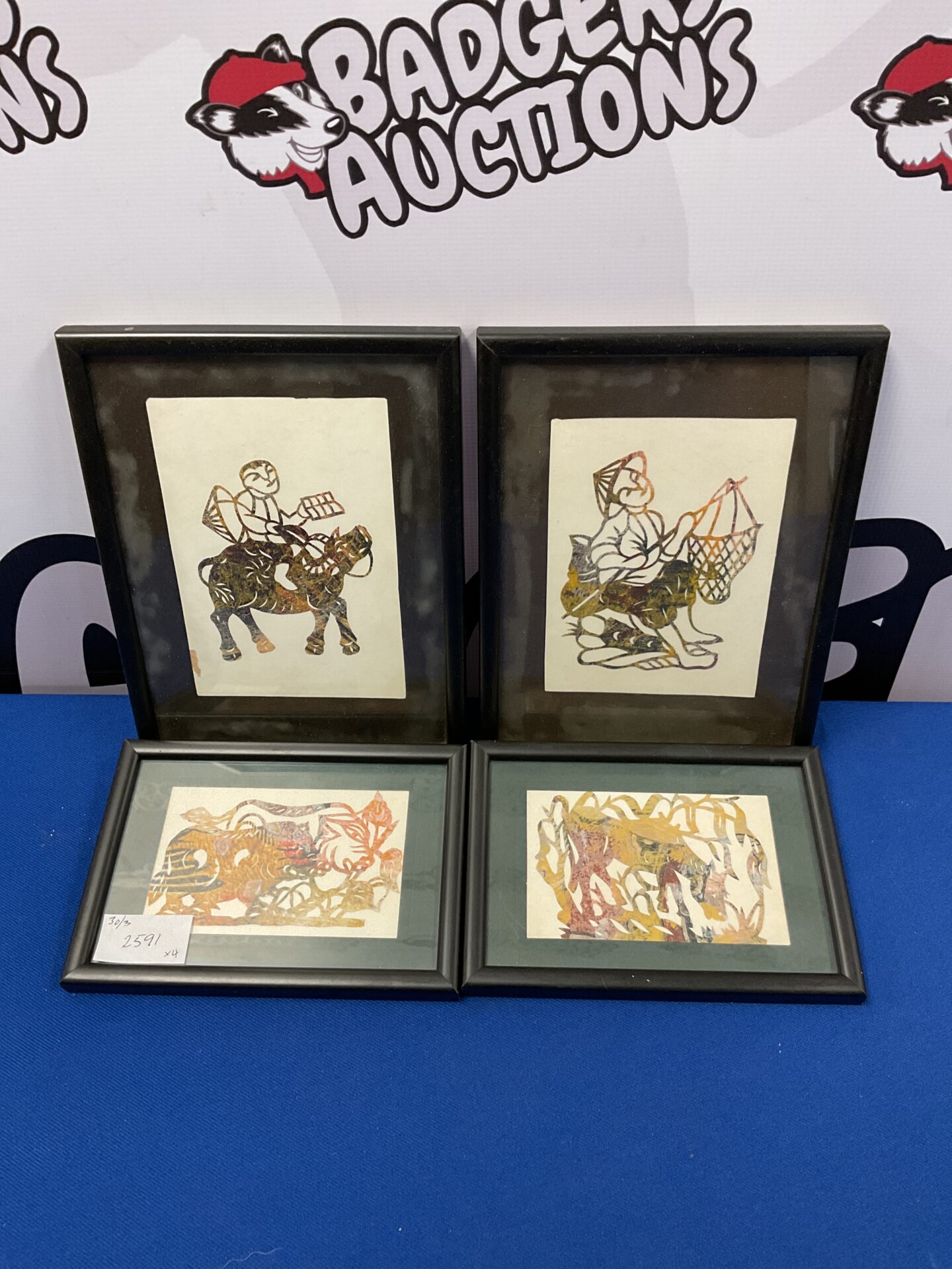 673 Set of four oriental cut paper artworks