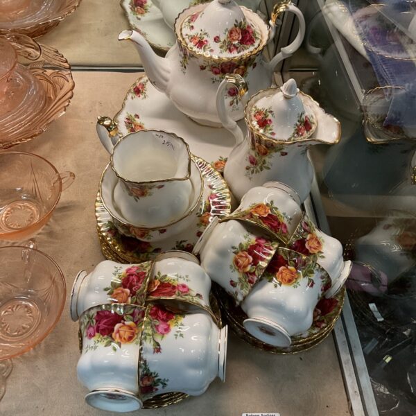 Vintage Royal Albert Old Country Rose tea set with floral details.