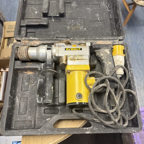 Used Dewalt 110v SDS drill in a carrying case.