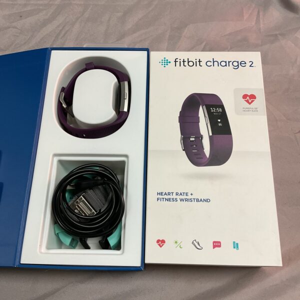 Fitbit Charge 2 fitness tracker in original packaging.