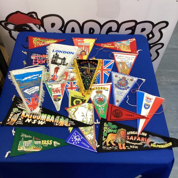 Vintage caravan pennants lot, colourful travel flags and souvenirs.