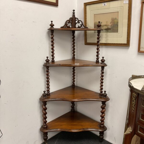Antique mahogany four-tier whatnot display stand.