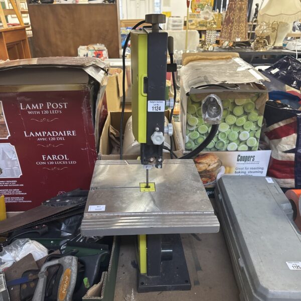 Ryobi bandsaw offered for spares or repair, missing power switch.