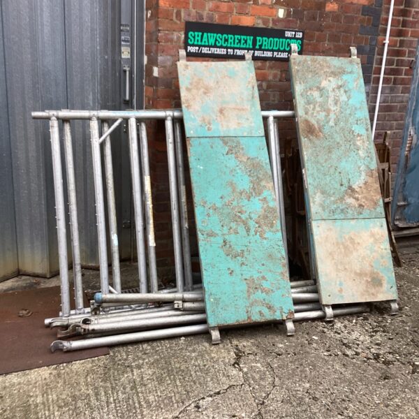 Aluminium scaffolding tower sections for construction and DIY projects.