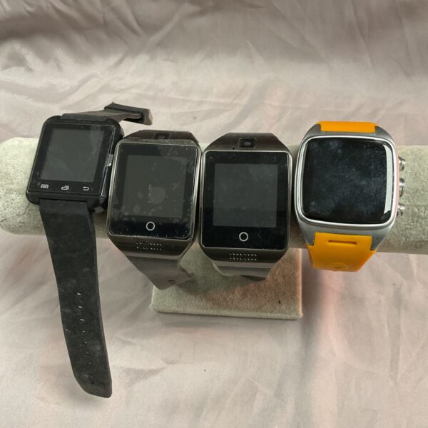 Black strap smart watch in a lot of untested wearable tech.